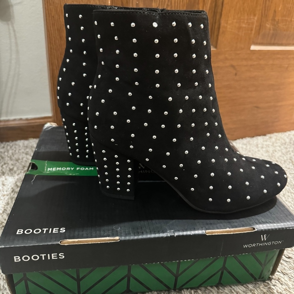 Black booties with round studs, size 8 Medium. Perfect condition.